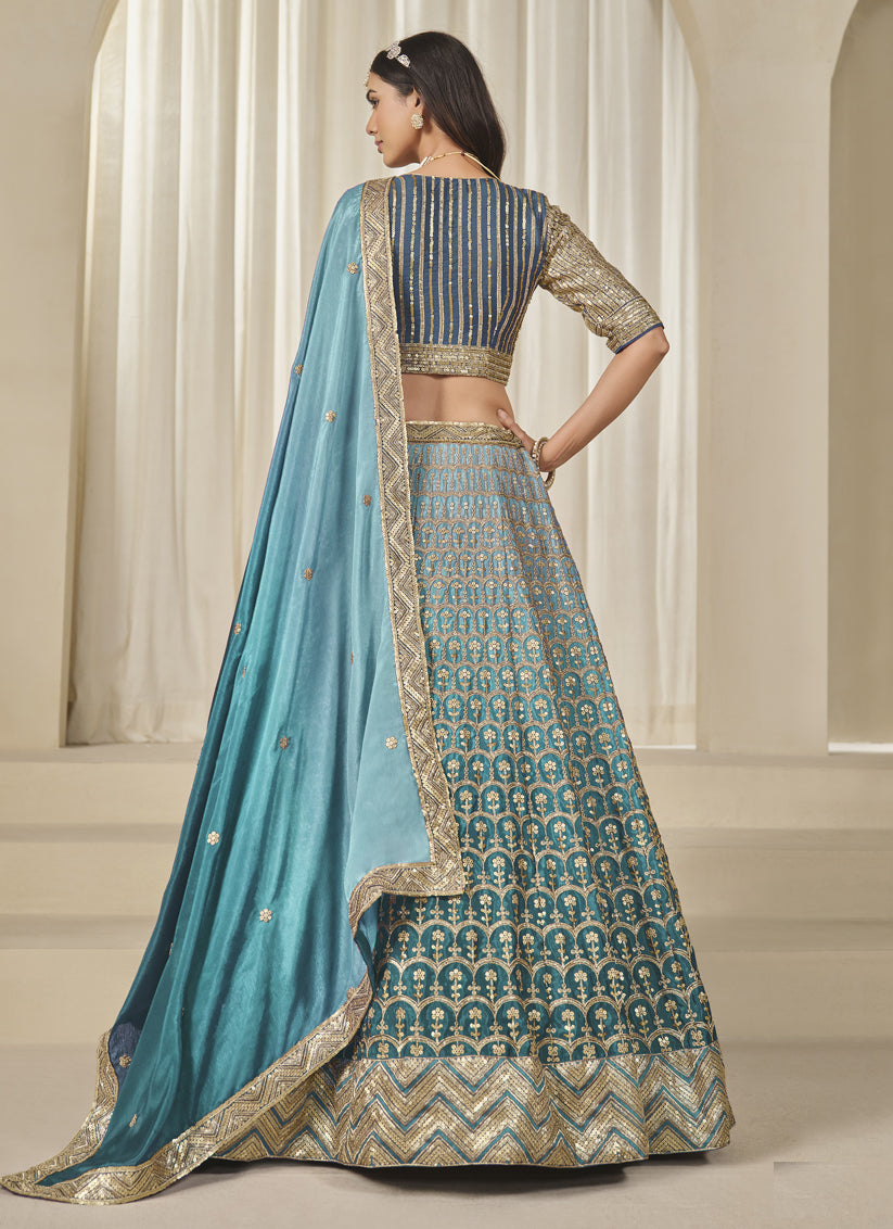Teal Blue Heavy Embroidered Premium Chinnon Silk Lehenga Choli Set