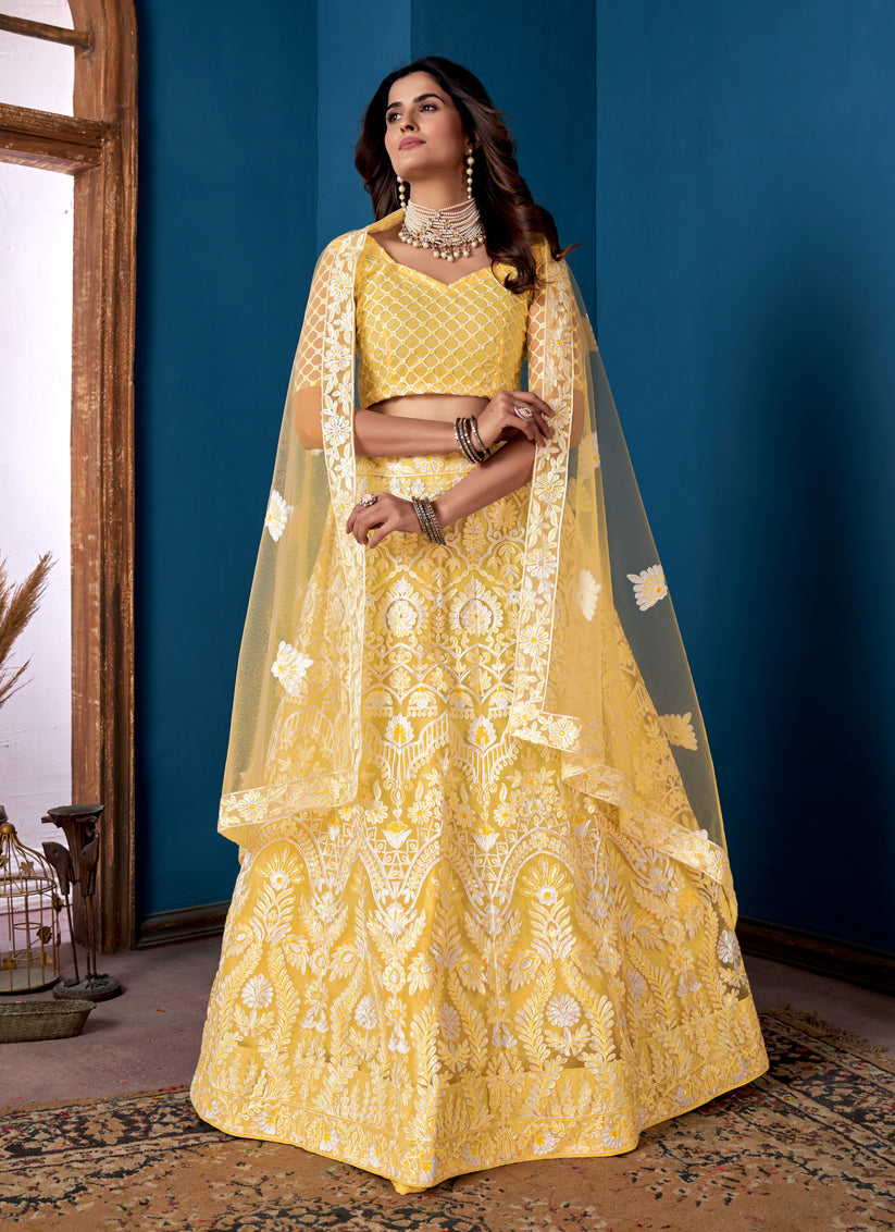 Lemon Yellow Net Embroidered Wedding Wear Lehenga Choli