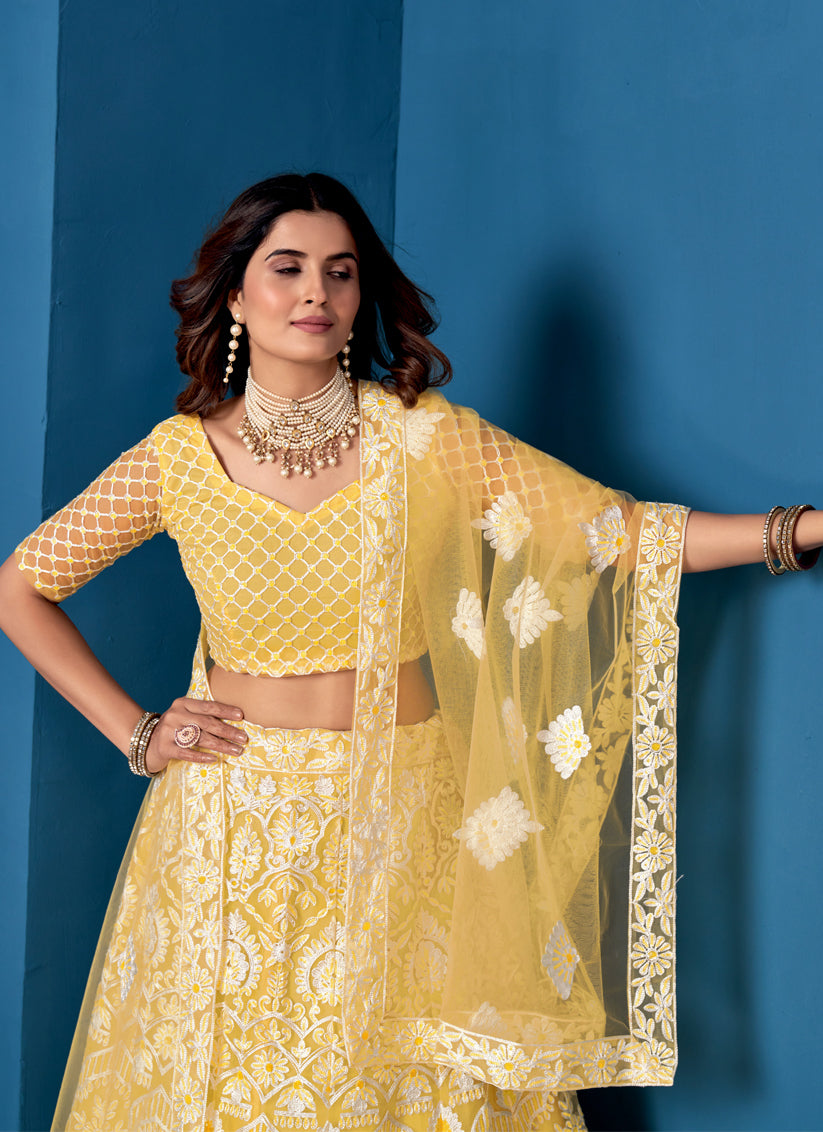 Lemon Yellow Net Embroidered Wedding Wear Lehenga Choli