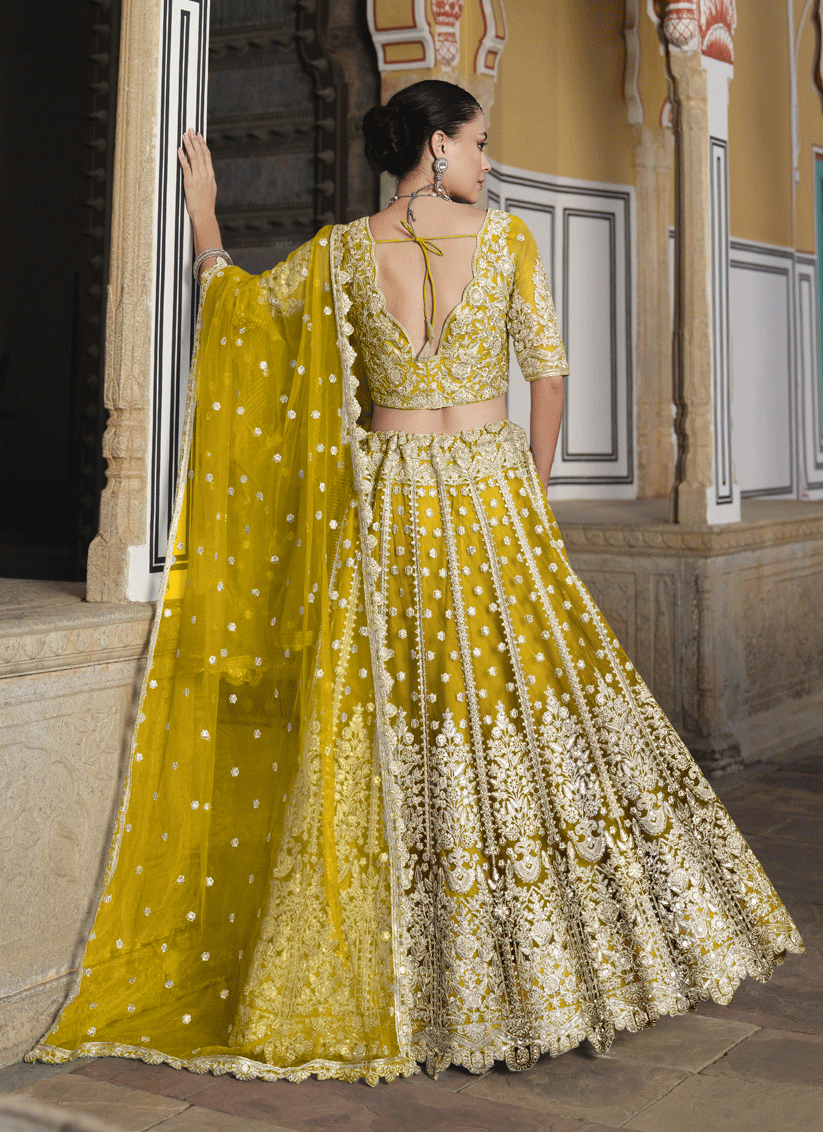 Lemon Yellow Net & Embroidered Lehenga Choli