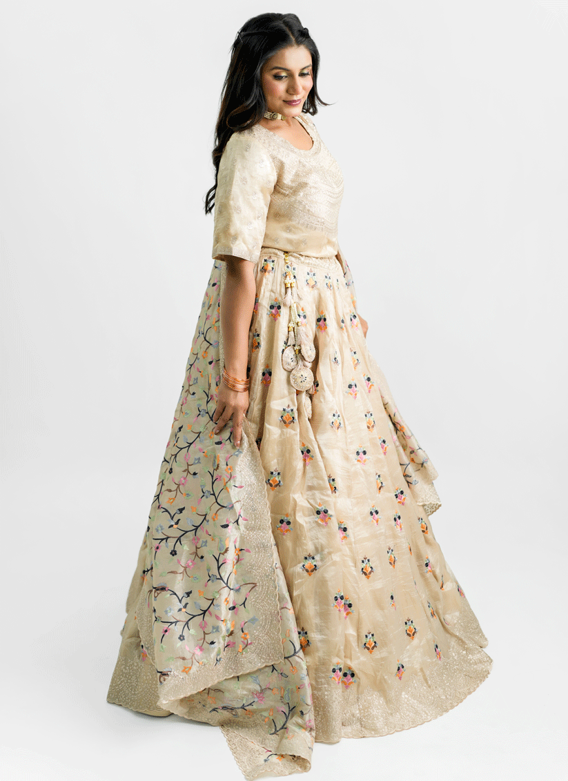 Cream Tissue Heavy Embroidered Designer Lehenga Choli