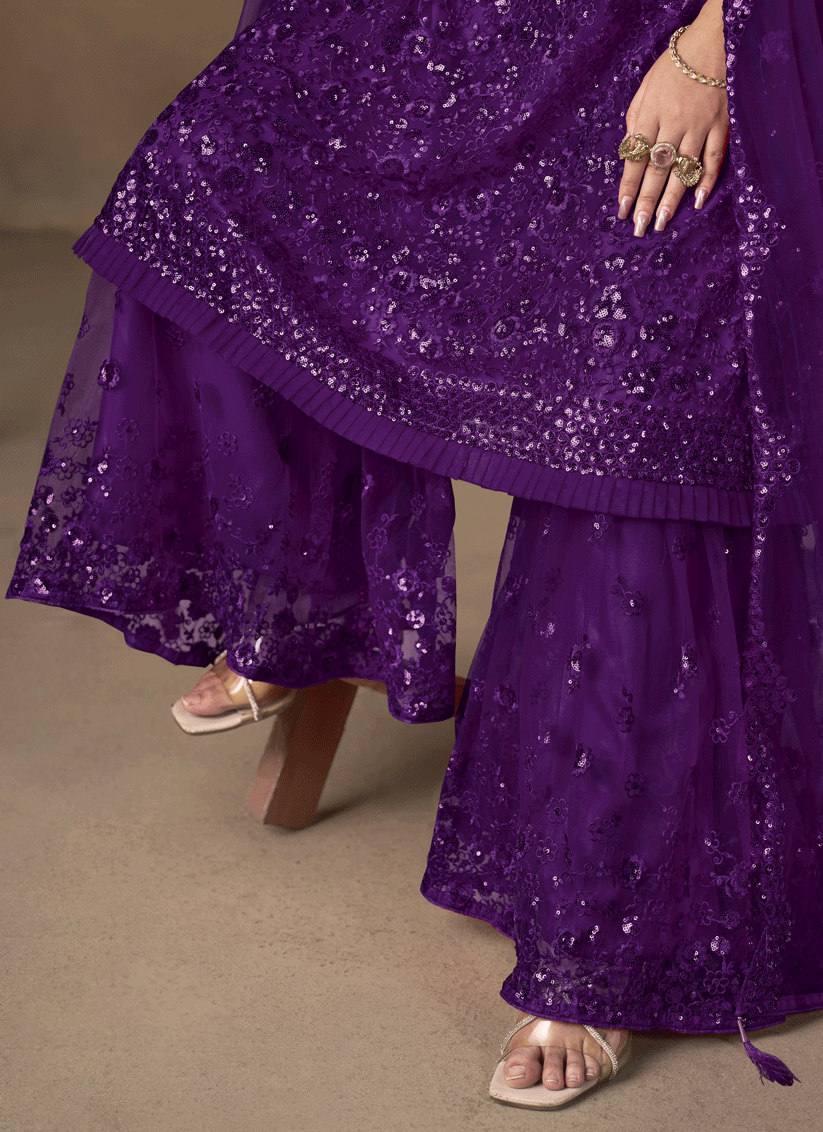 Stunning Purple Designer Net Sharara Kameez for Memorable Celebrations