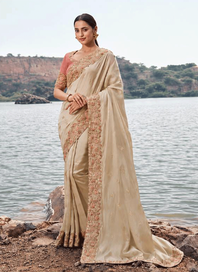 Elegant Beige Satin Silk Saree Featuring Sequins and Stone Work for Festive Wear