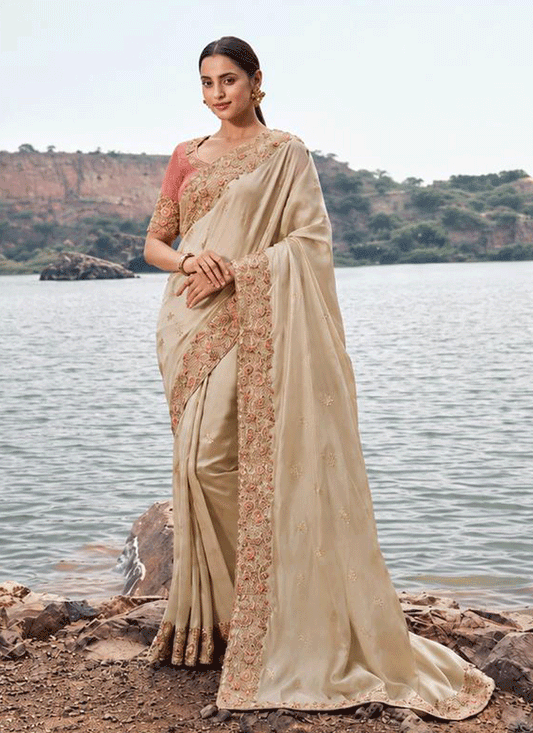 Elegant Beige Satin Silk Saree Featuring Sequins and Stone Work for Festive Wear