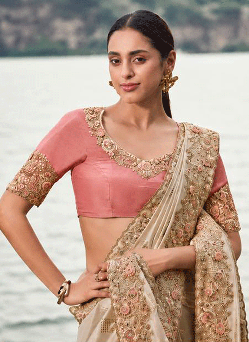 Elegant Beige Satin Silk Saree Featuring Sequins and Stone Work for Festive Wear