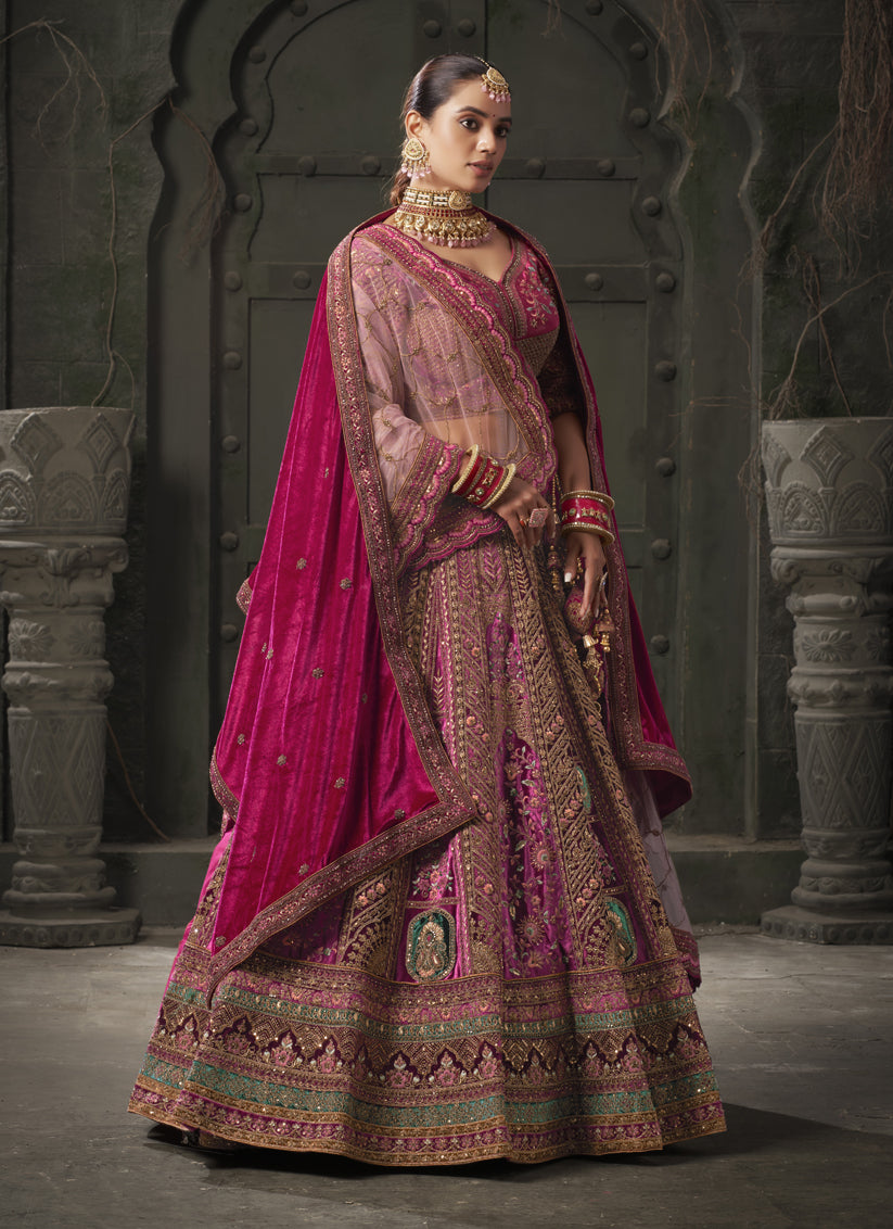 Rani Pink and Maroon Velvet Hand Embroidered Bridal Lehenga Choli