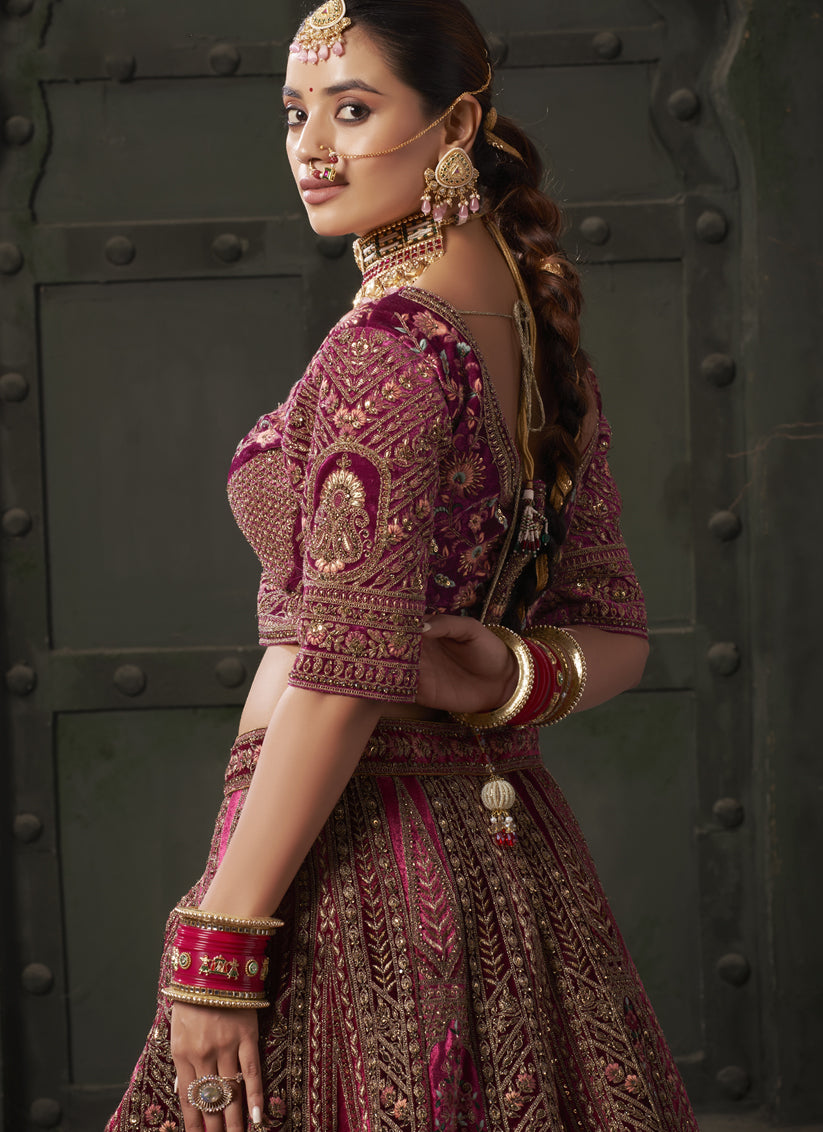 Rani Pink and Maroon Velvet Hand Embroidered Bridal Lehenga Choli