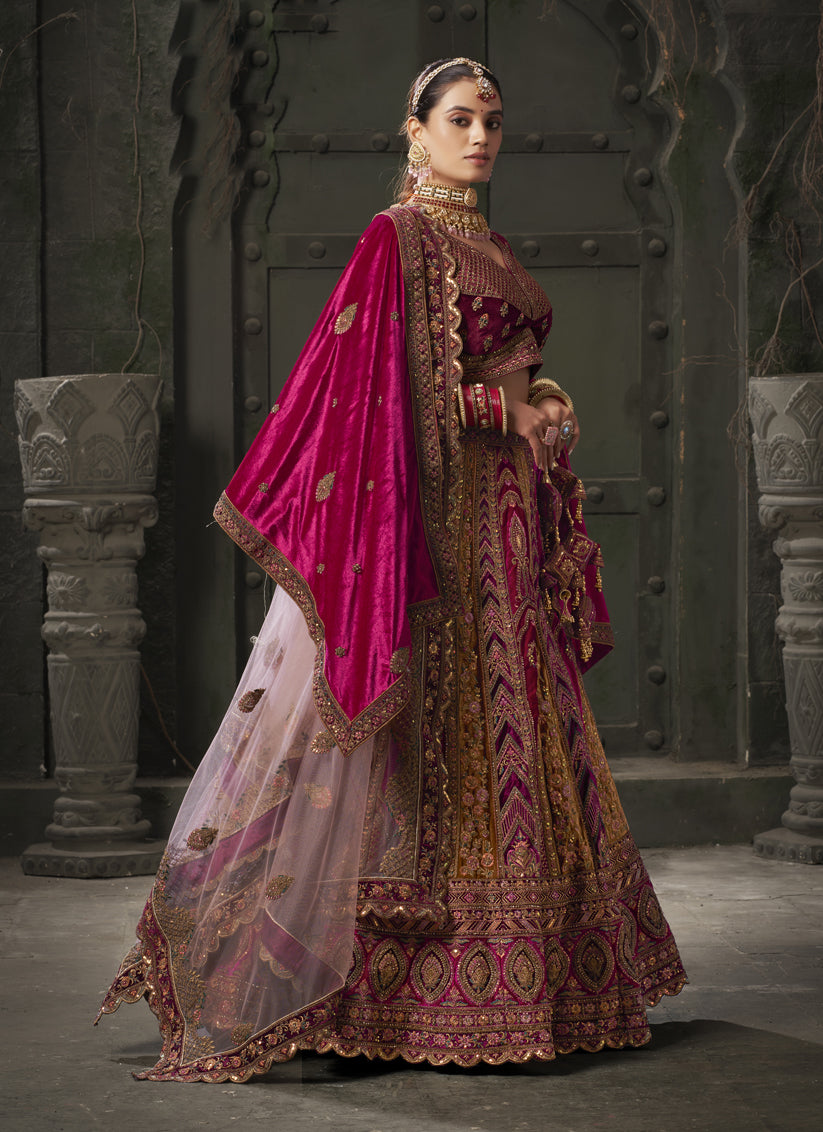 Rani Pink and Musterd Velvet Hand Embroidered Bridal Lehenga Choli