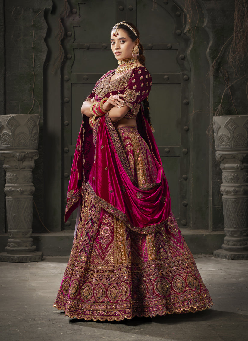 Rani Pink and Musterd Velvet Hand Embroidered Bridal Lehenga Choli