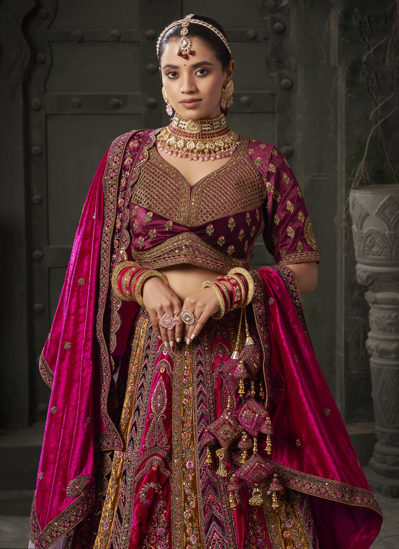 Rani Pink and Musterd Velvet Hand Embroidered Bridal Lehenga Choli