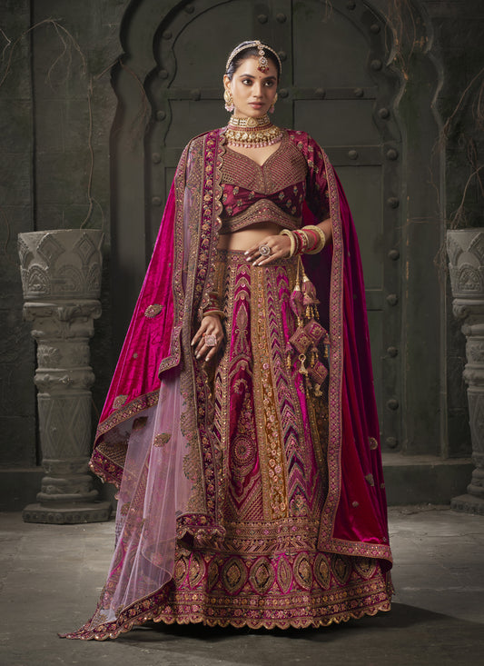 Rani Pink and Musterd Velvet Hand Embroidered Bridal Lehenga Choli