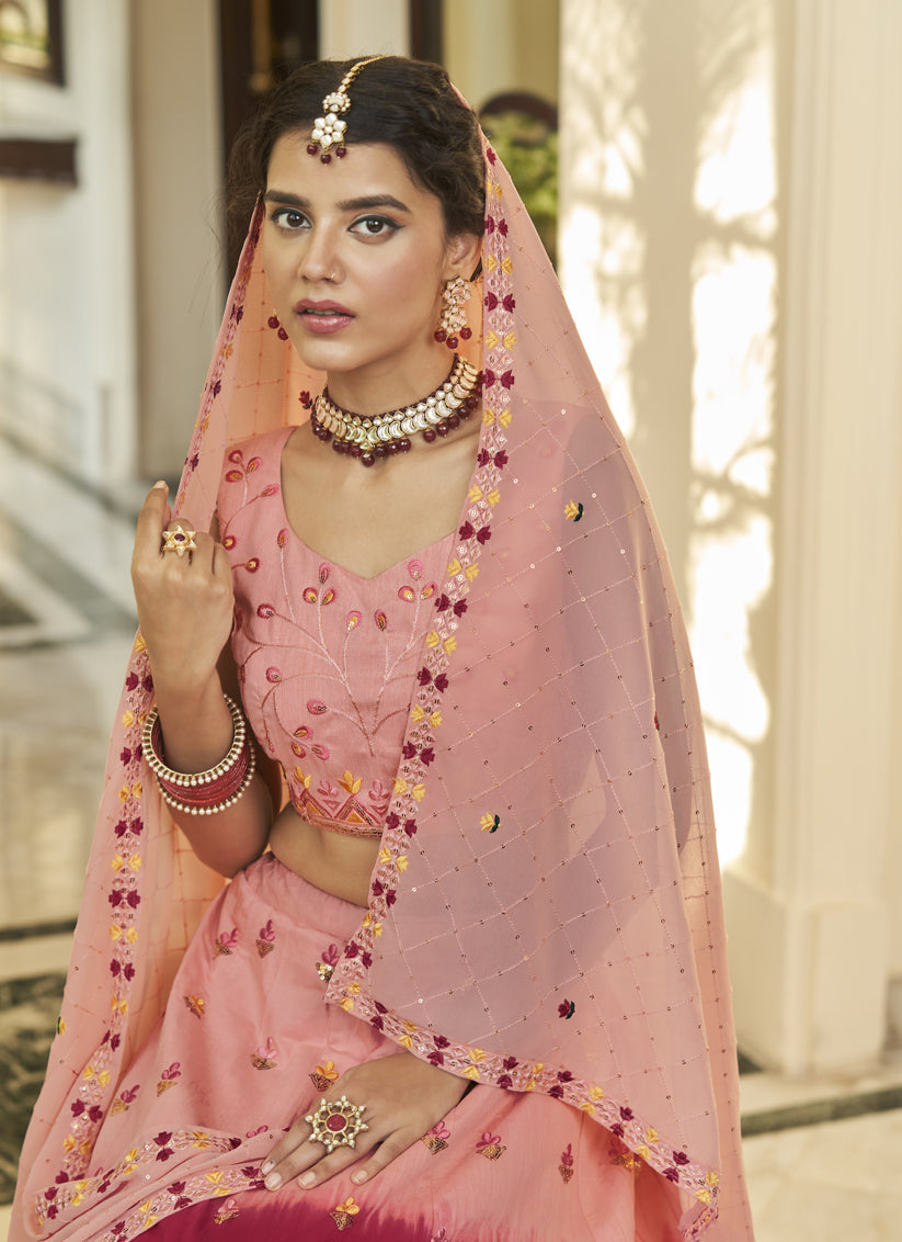 Strawberry and Peach Art Silk Embroidered Wedding Lehenga Choli