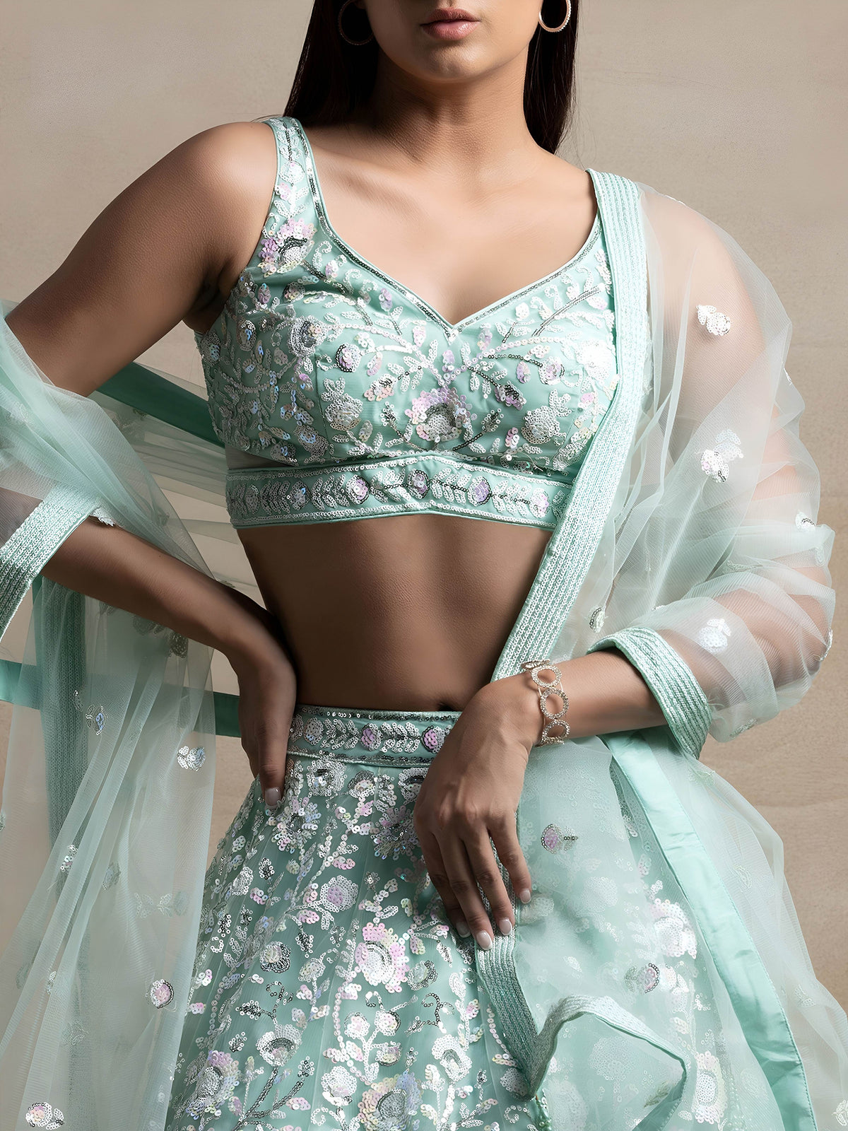 Sky Blue Soft Net Sequins Embroidered Lehenga Choli