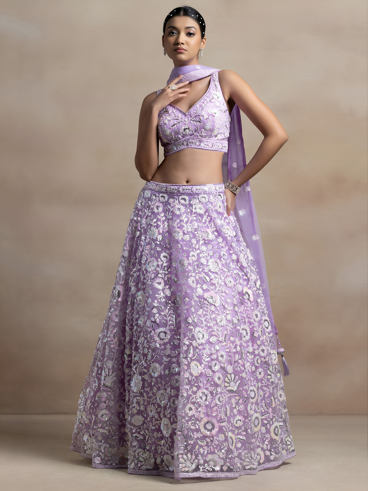 Lavender Soft Net Sequins Embroidered Lehenga Choli