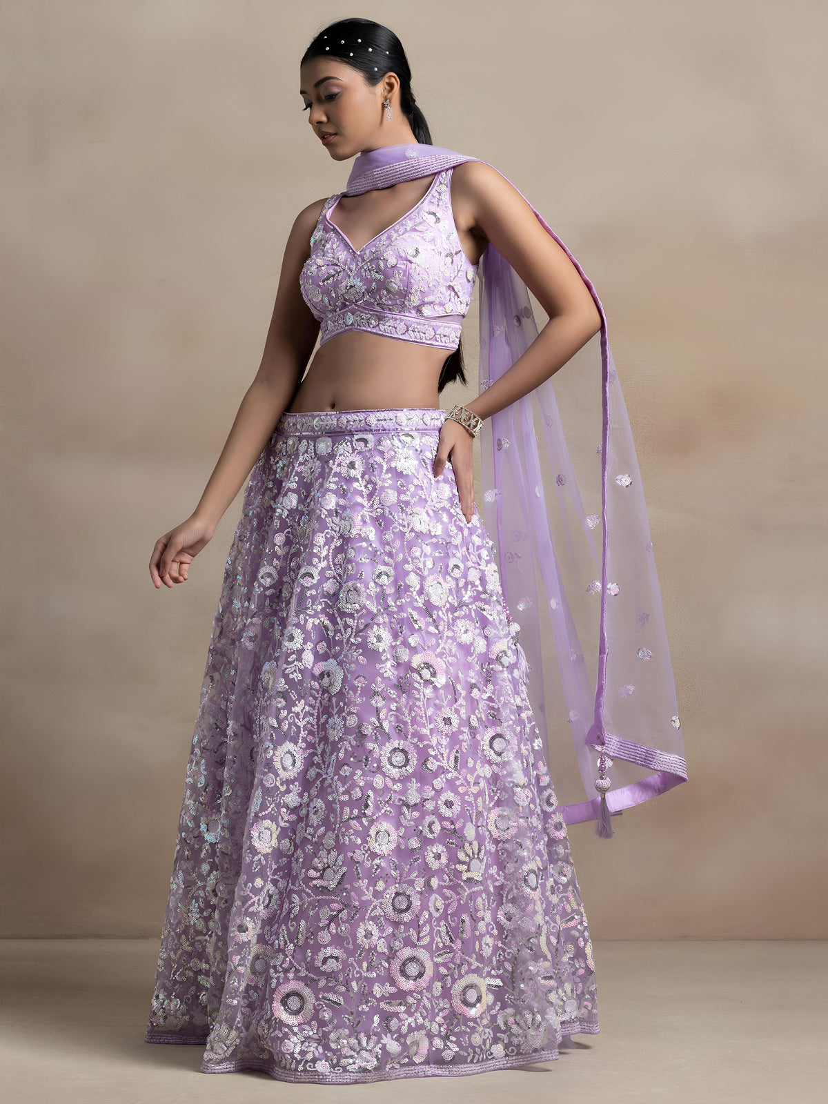 Lavender Soft Net Sequins Embroidered Lehenga Choli