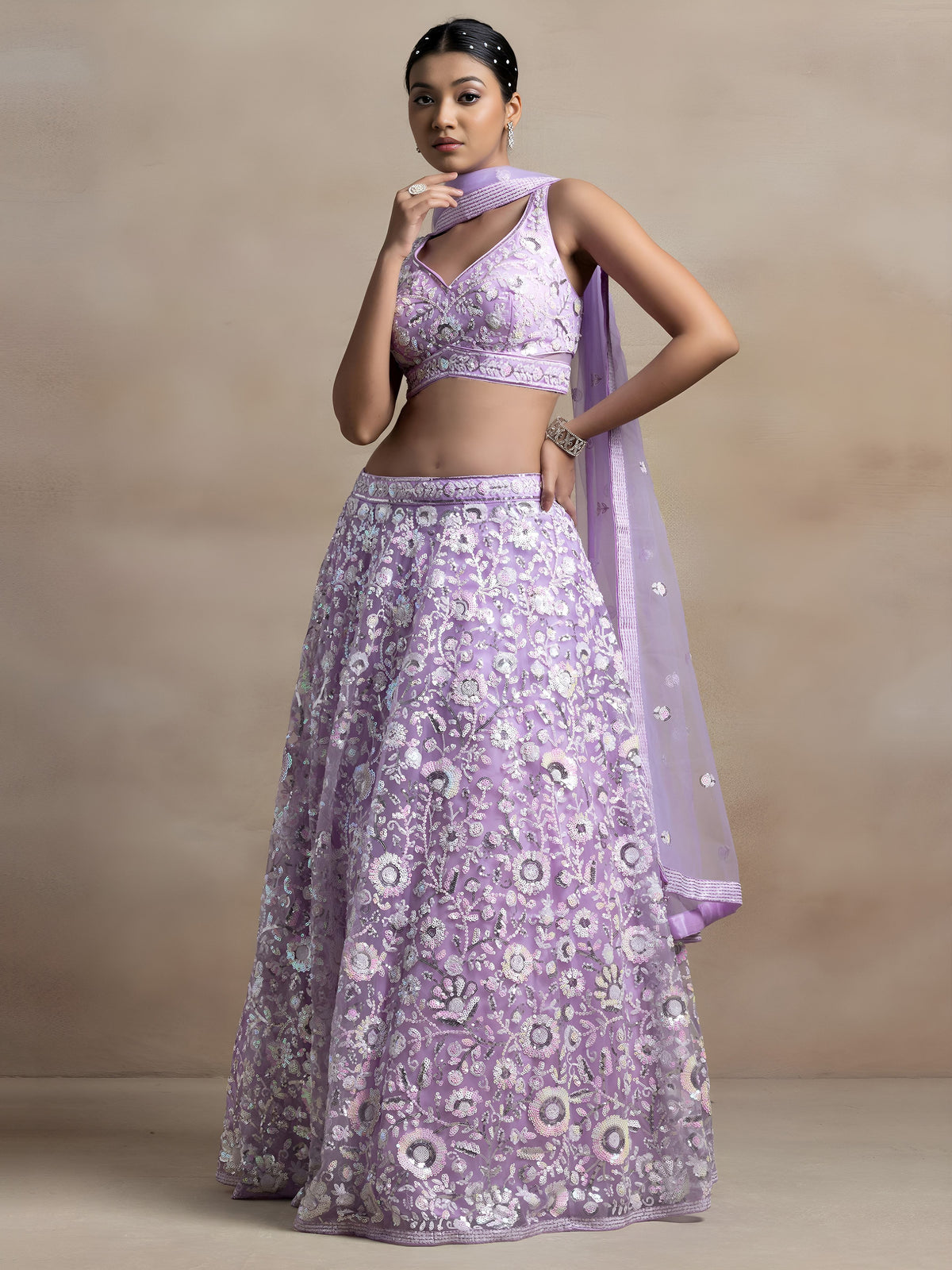 Lavender Soft Net Sequins Embroidered Lehenga Choli