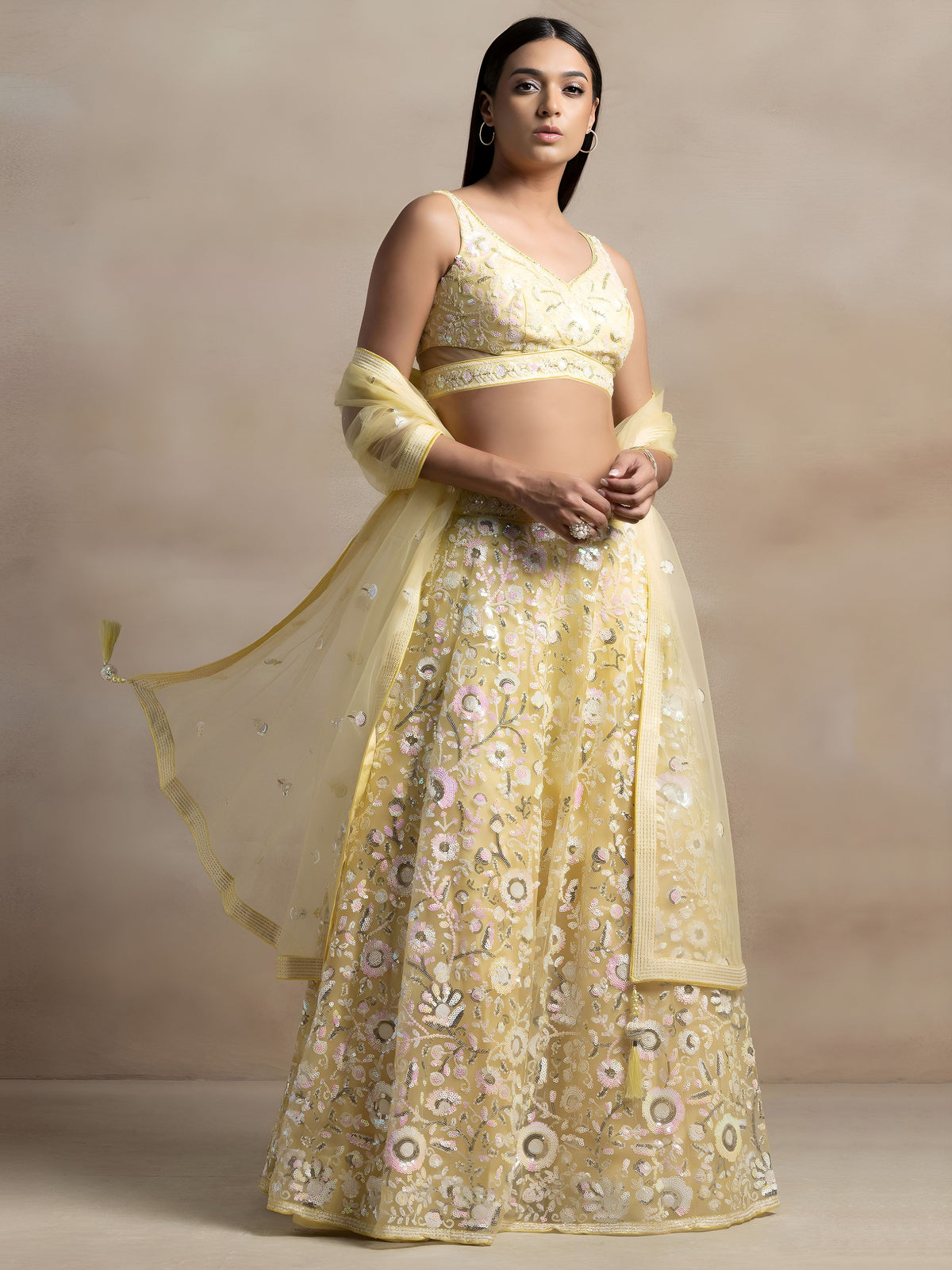 Pastel Yellow  Soft Net Sequins Embroidered Lehenga Choli