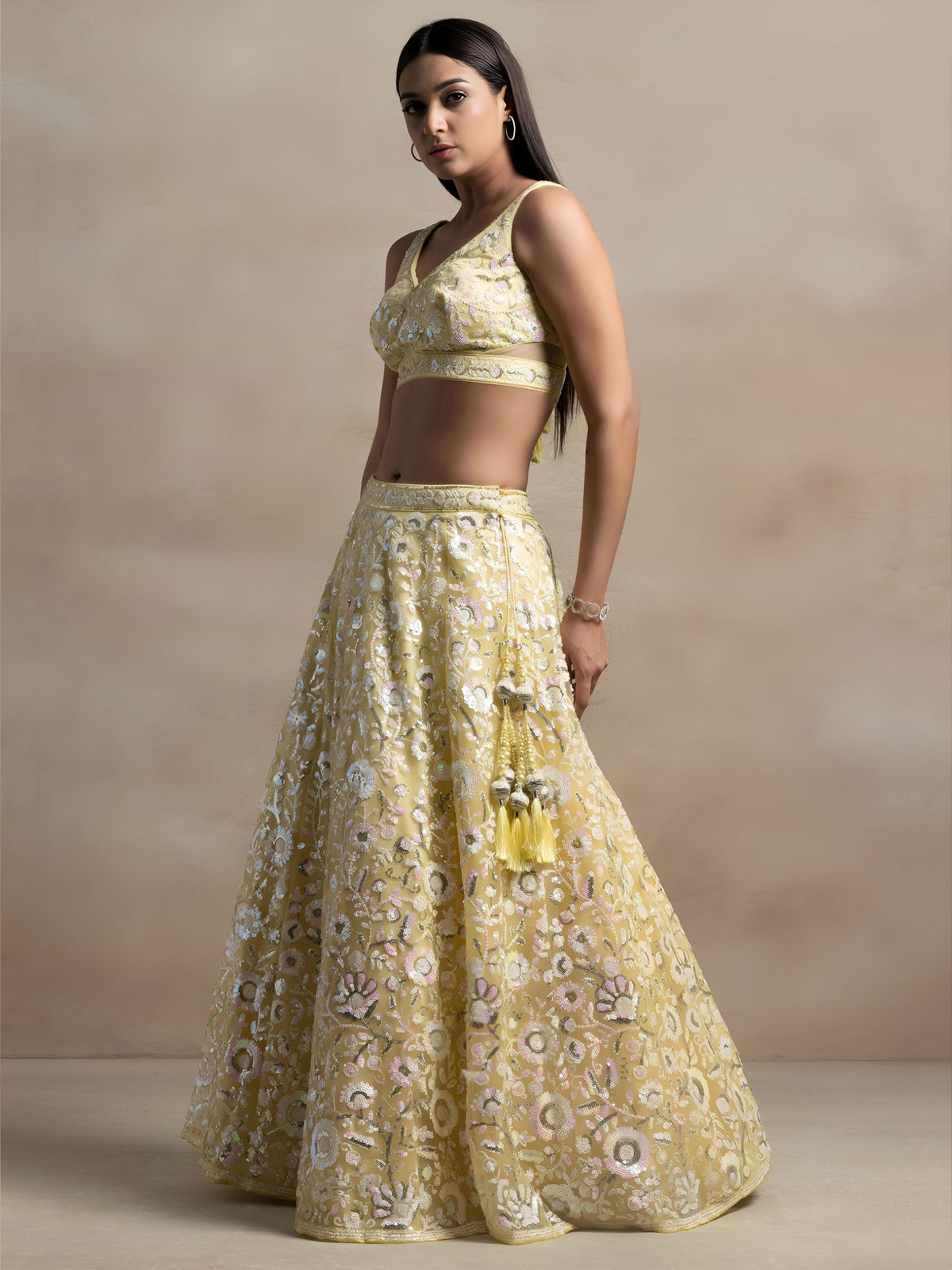 Pastel Yellow  Soft Net Sequins Embroidered Lehenga Choli