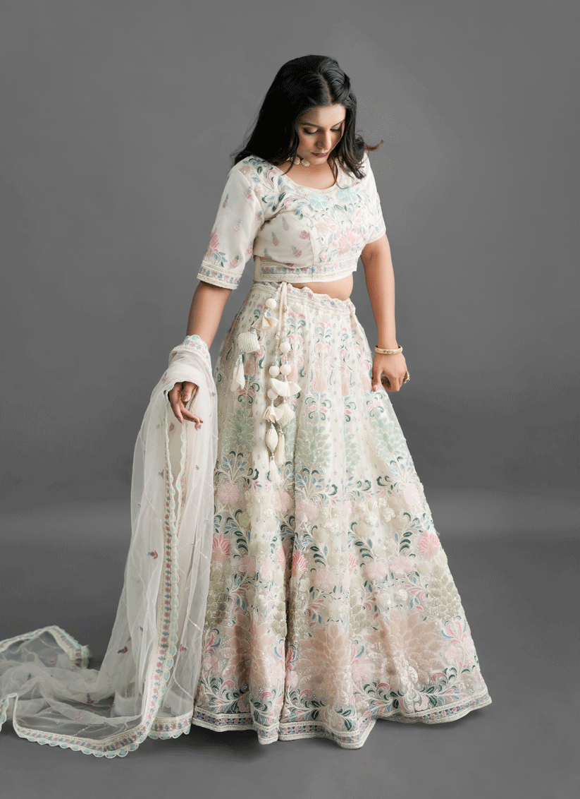 Ivory Net Heavy Thread Embroidered   Designer Lehenga Choli