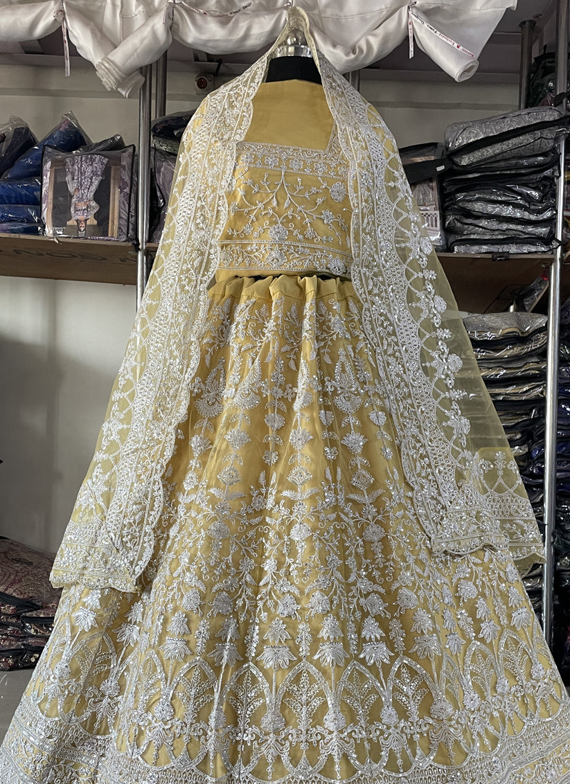 Maize Yellow Net Embroidered Designer Lehenga Choli