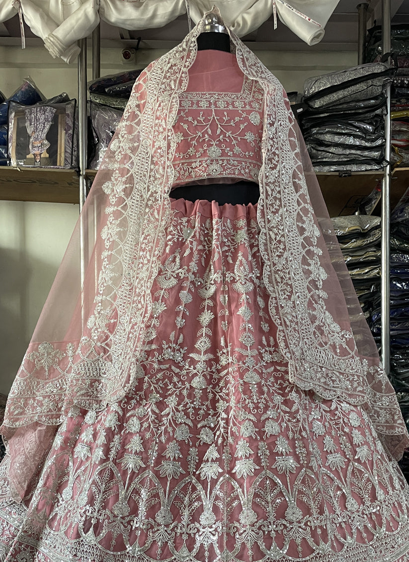 Carnation Pink Net Embroidered Designer Lehenga Choli