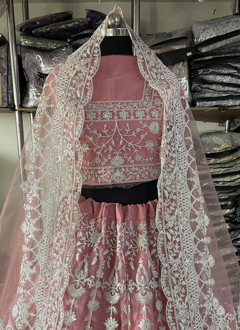 Carnation Pink Net Embroidered Designer Lehenga Choli