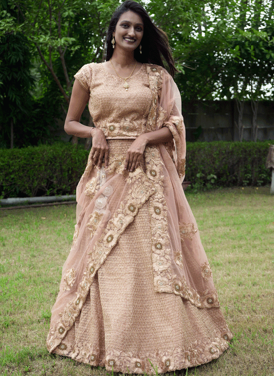 Peach Net Heavy Embellished Designer Lehenga Choli