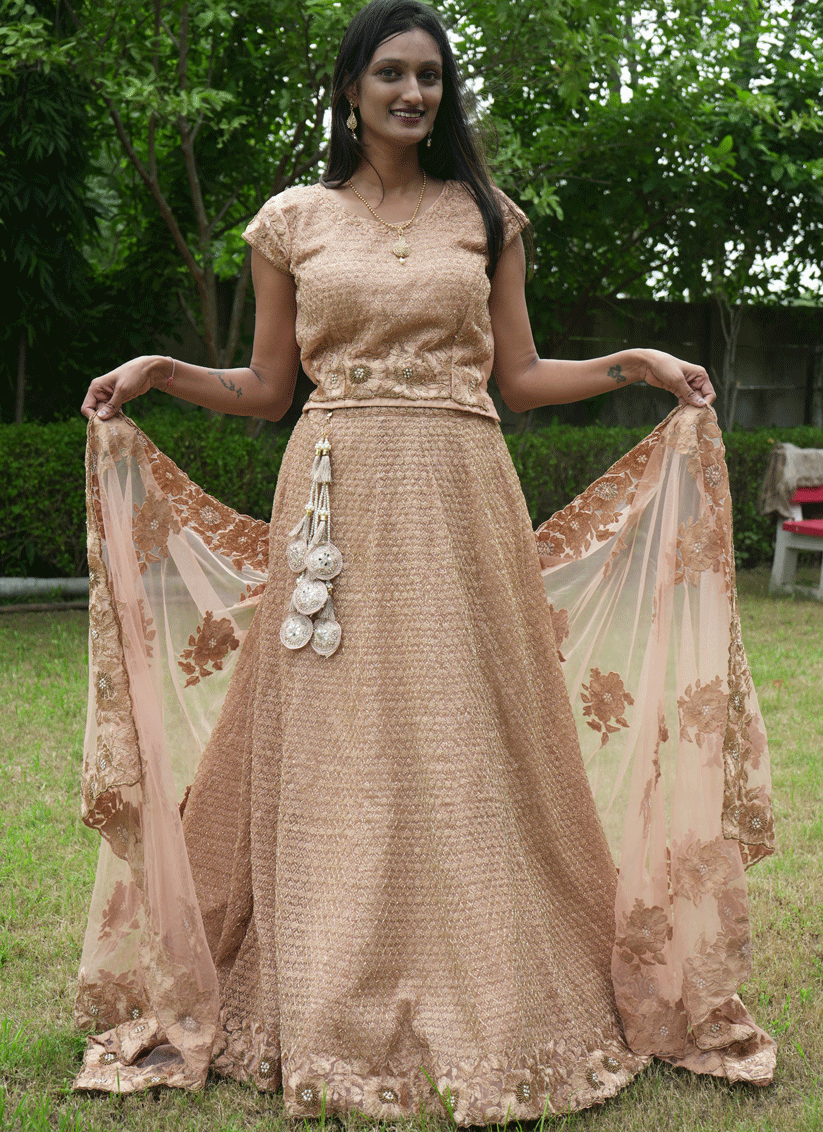 Peach Net Heavy Embellished Designer Lehenga Choli