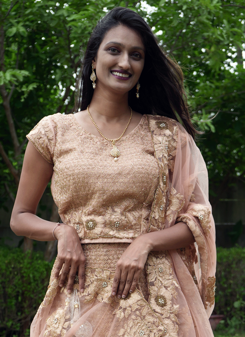 Peach Net Heavy Embellished Designer Lehenga Choli