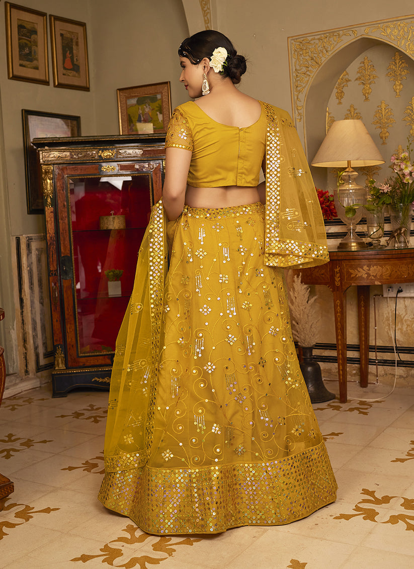 Turmeric Yellow Net Embroidered Wedding Lehenga Choli