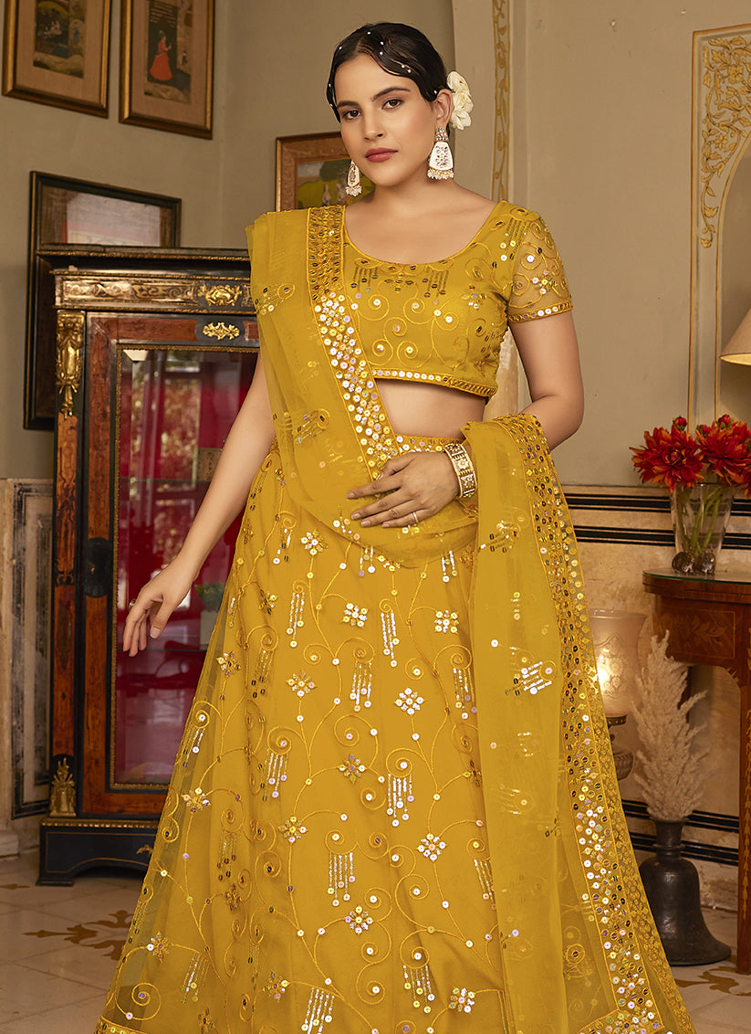 Turmeric Yellow Net Embroidered Wedding Lehenga Choli