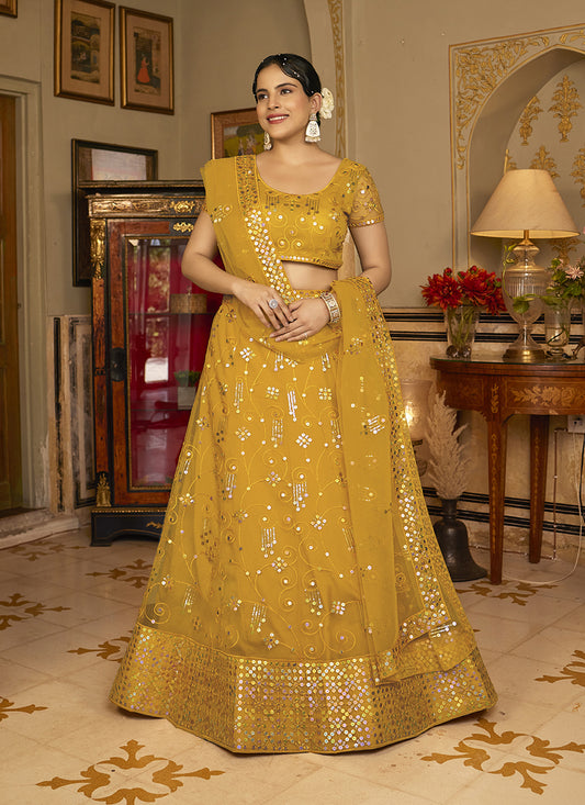 Turmeric Yellow Net Embroidered Wedding Lehenga Choli