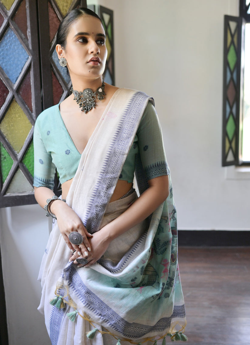 Ivory Cotton Ikkat Woven Saree For Festival