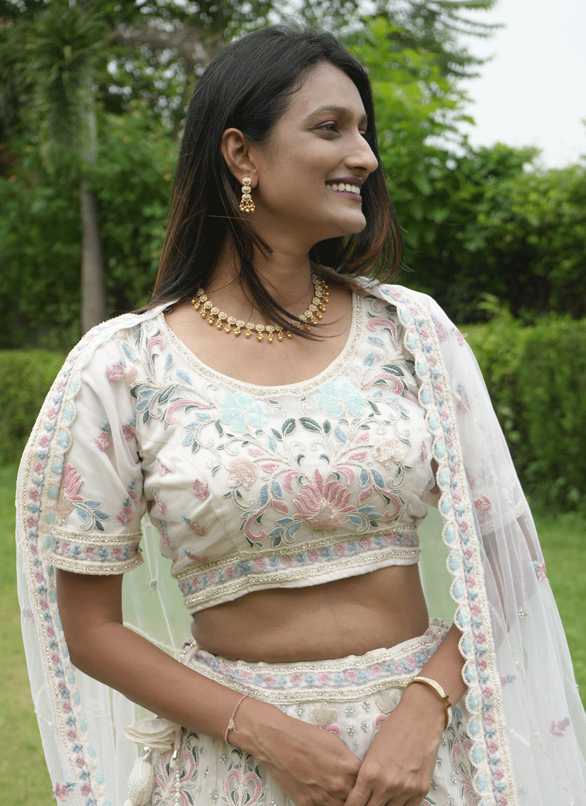 Ivory Net Heavy Thread Embroidered   Designer Lehenga Choli