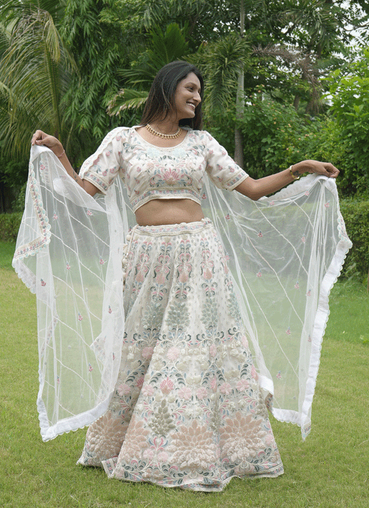Ivory Net Heavy Thread Embroidered   Designer Lehenga Choli