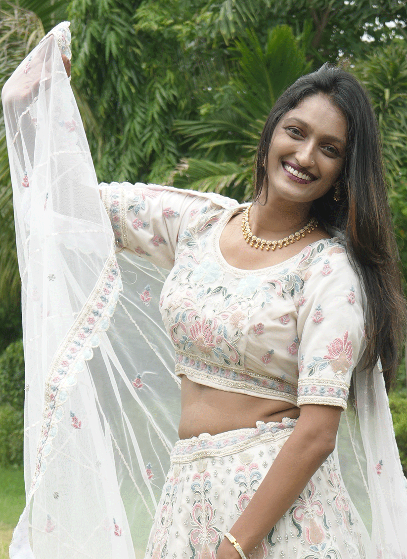 Ivory Net Heavy Thread Embroidered   Designer Lehenga Choli