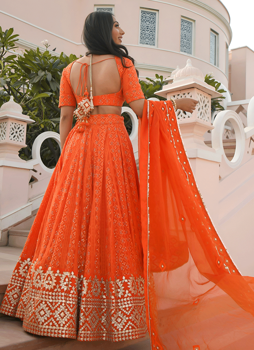 Tangy Orange Designer Georgette Lehenga Choli for Festive Wear