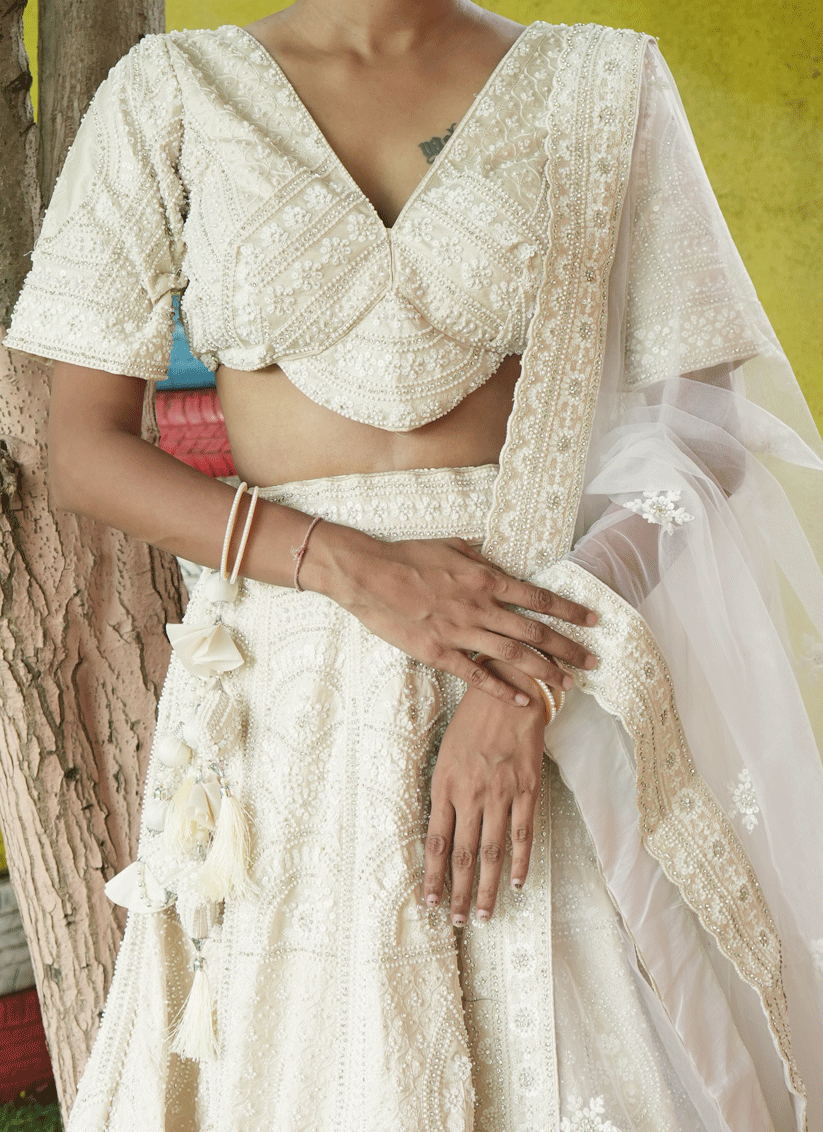 Ivory Silk Heavy Hand Beads Designer Lehenga Choli