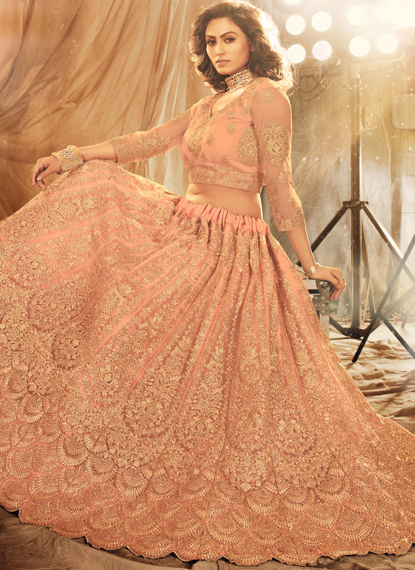 Peach Net Heavy Embroidered Wedding Lehenga Choli