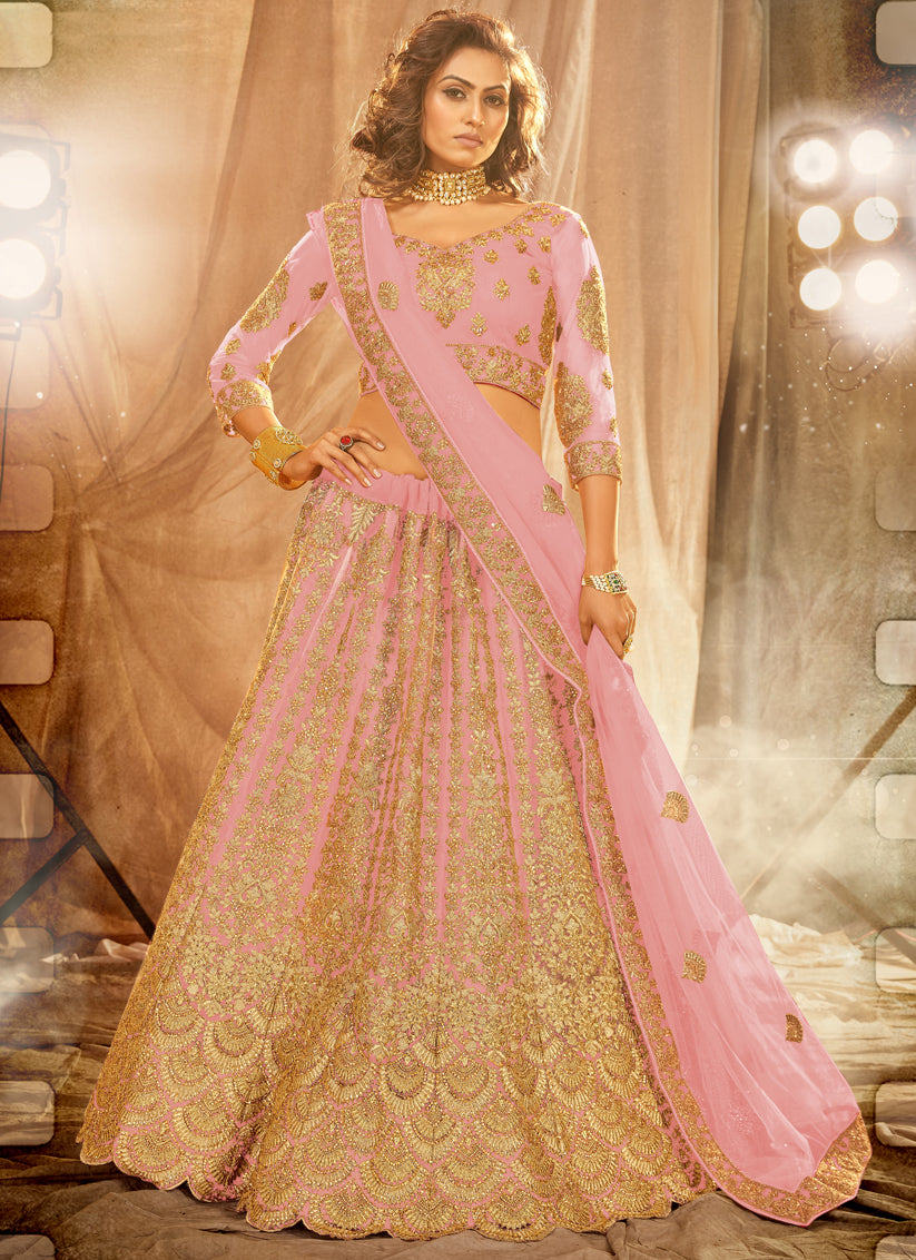 Pink Net Heavy Embroidered Wedding Lehenga Choli