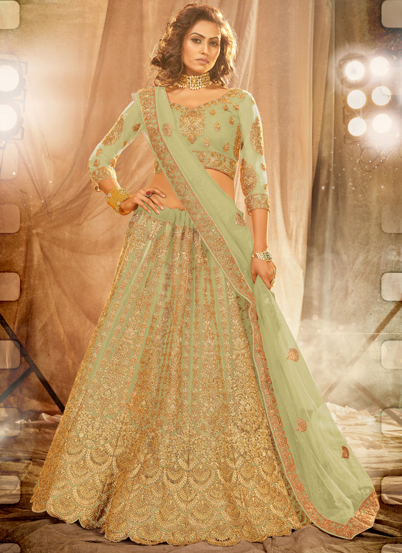 Pastel Green Net Heavy Embroidered Wedding Lehenga Choli