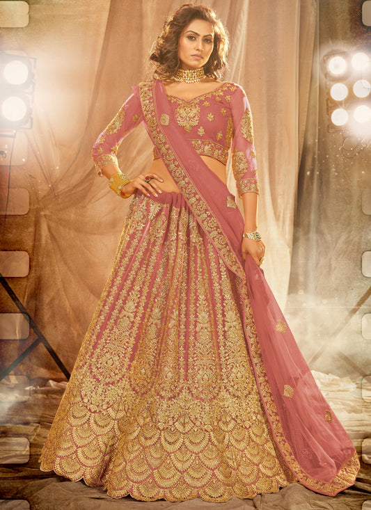 Rose Pink Net Heavy Embroidered Wedding Lehenga Choli